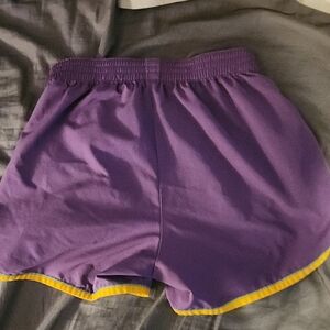 Under Armour Purple Shorts with Yellow Trim